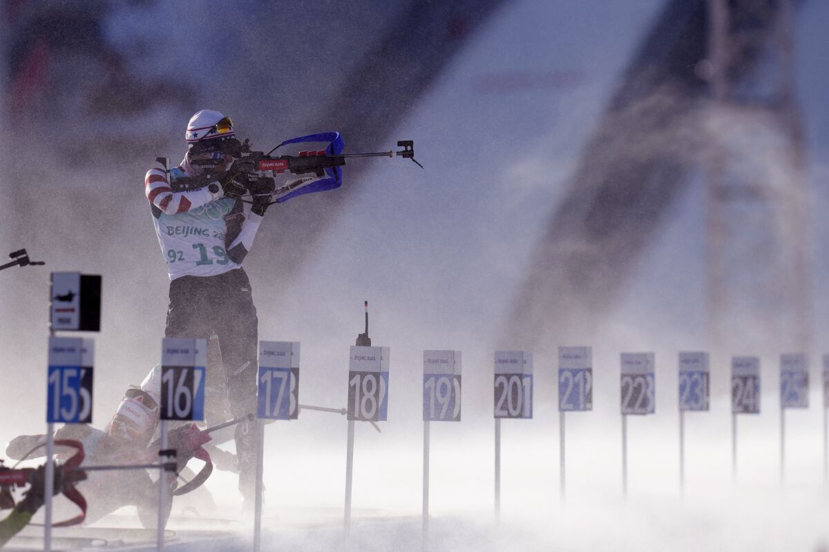 Clare Egan takes target practice before the 4x6-kilometer mixed relay at the 2022 Winter Olympics, Saturday, Feb. 5, 2022, in Zhangjiakou, China. (AP Photo/Kirsty Wigglesworth)