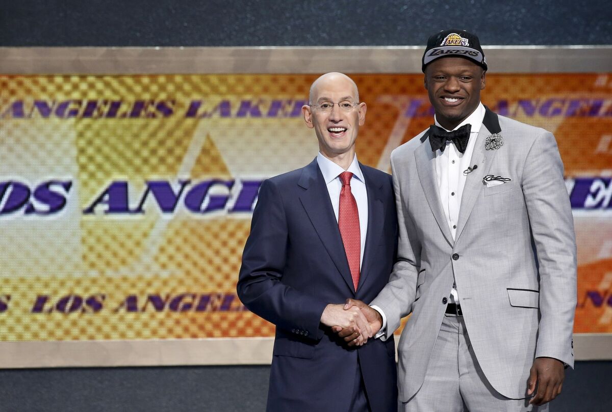 Julius Randle poses for a photo with NBA Commissioner Adam Silver after being selected No. 7 overall in the NBA draft on Thursday by the Lakers.