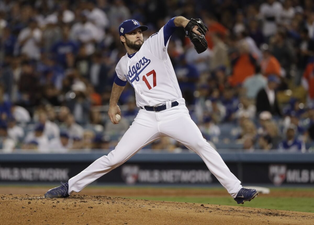 Brandon Morrow delivers during the second inning in Game 7 of the World Series between the Dodgers and Houston Astros.