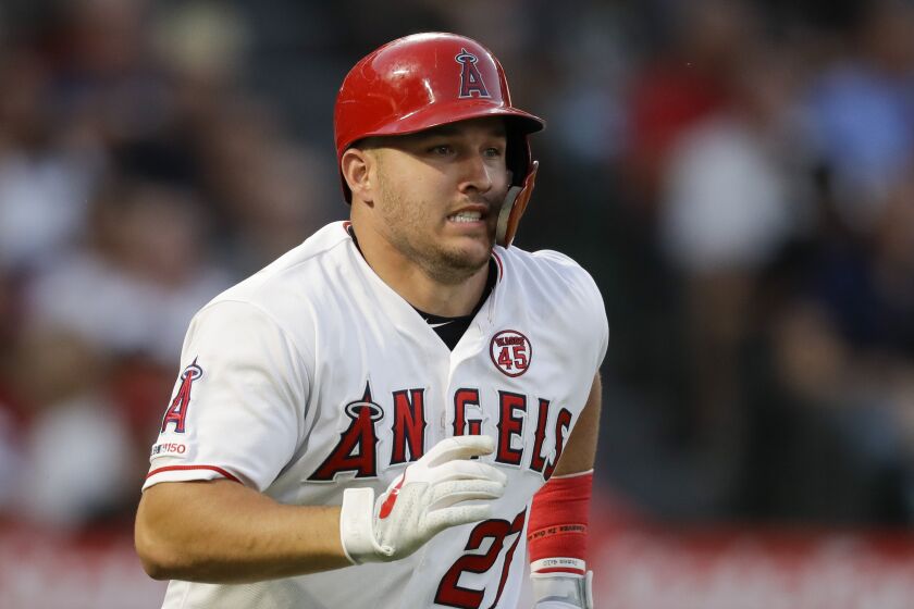 Los Angeles Angels' Mike Trout runs to first during a baseball game against the Boston Red Sox in Anaheim, Calif., Saturday, Aug. 31, 2019. (AP Photo/Chris Carlson)