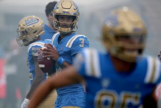 Pasadena, CA - UCLA Bruins quarterback Dante Moore wrms up before a non-conference game against the North Carolina Central University Eagles at the Rose Bowl in Pasadena on Saturday, Sept. 16, 2023. The Bruins won, 59-7. (Luis Sinco / Los Angeles Times)
