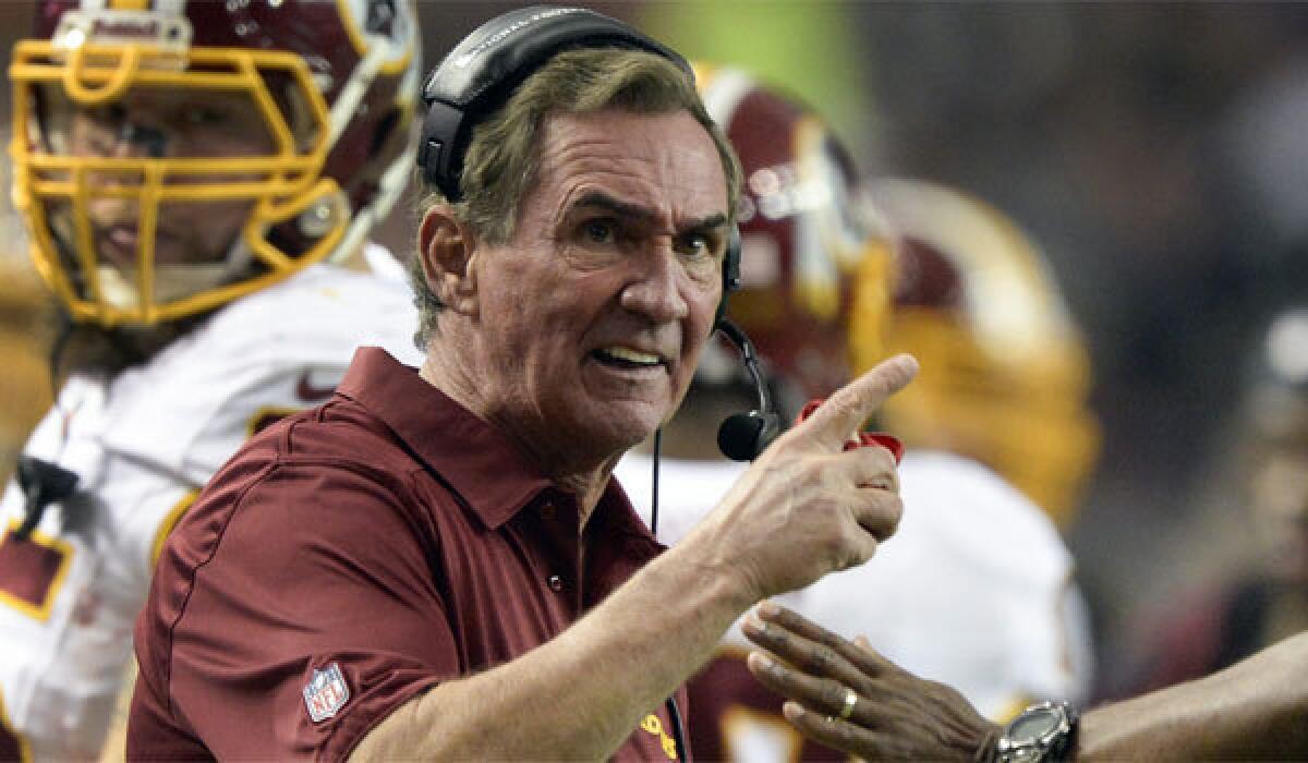 Washington Coach Mike Shanahan complains about a referee's call against during Sunday's game against Atlanta.