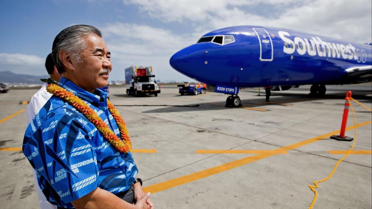 Hawaii Gov. David Ige greeted Southwest Airlines' inaugural flight to Hawaii in Honolulu on March 17.