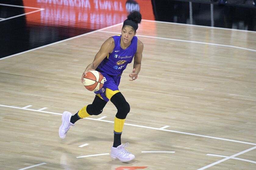Los Angeles Sparks forward Candace Parker (3) brings the ball up the court during the first half of a WNBA basketball game against the Indiana Fever, Saturday, Aug. 15, 2020, in Bradenton, Fla. (AP Photo/Phelan M. Ebenhack)