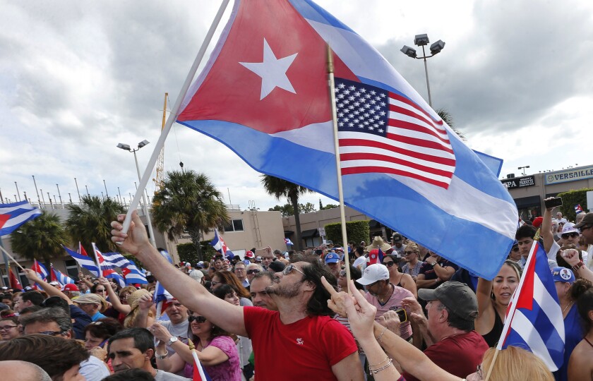 Cuban Americans in Miami's Little Havana celebrate the death of former longtime Cuban leader Fidel Castro.
