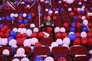 Luca Bernansconi, of New Jersey, sits alone in the stands after the conclusion of the Democratic National Convention.