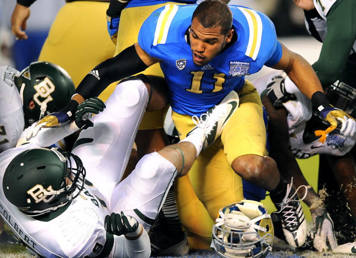 UCLA linebacker Anthony Barr looked plenty tough taking on Baylor, minus his helmet at the moment, during the Holiday Bowl in 2012.