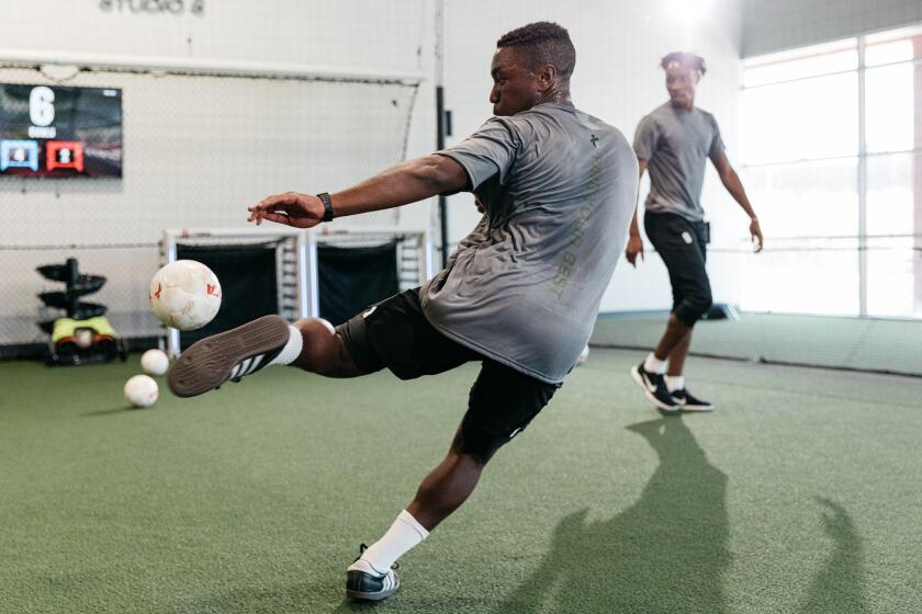 Soccer player takes volley from the TOCA Touch Trainer at TOCA Football’s Costa Mesa Facility in Costa Mesa.