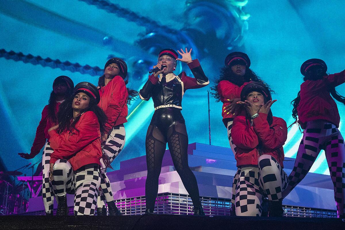 Janelle Monae performs at Coachella with a group of dancers. (Brian van der Brug / Los Angeles Times)