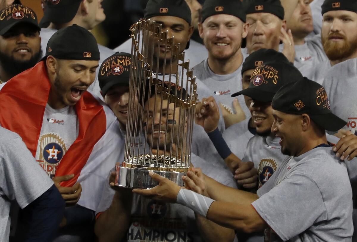 The Houton Astros celebrate with the Commissioner's Trophy in November 1, 2017.