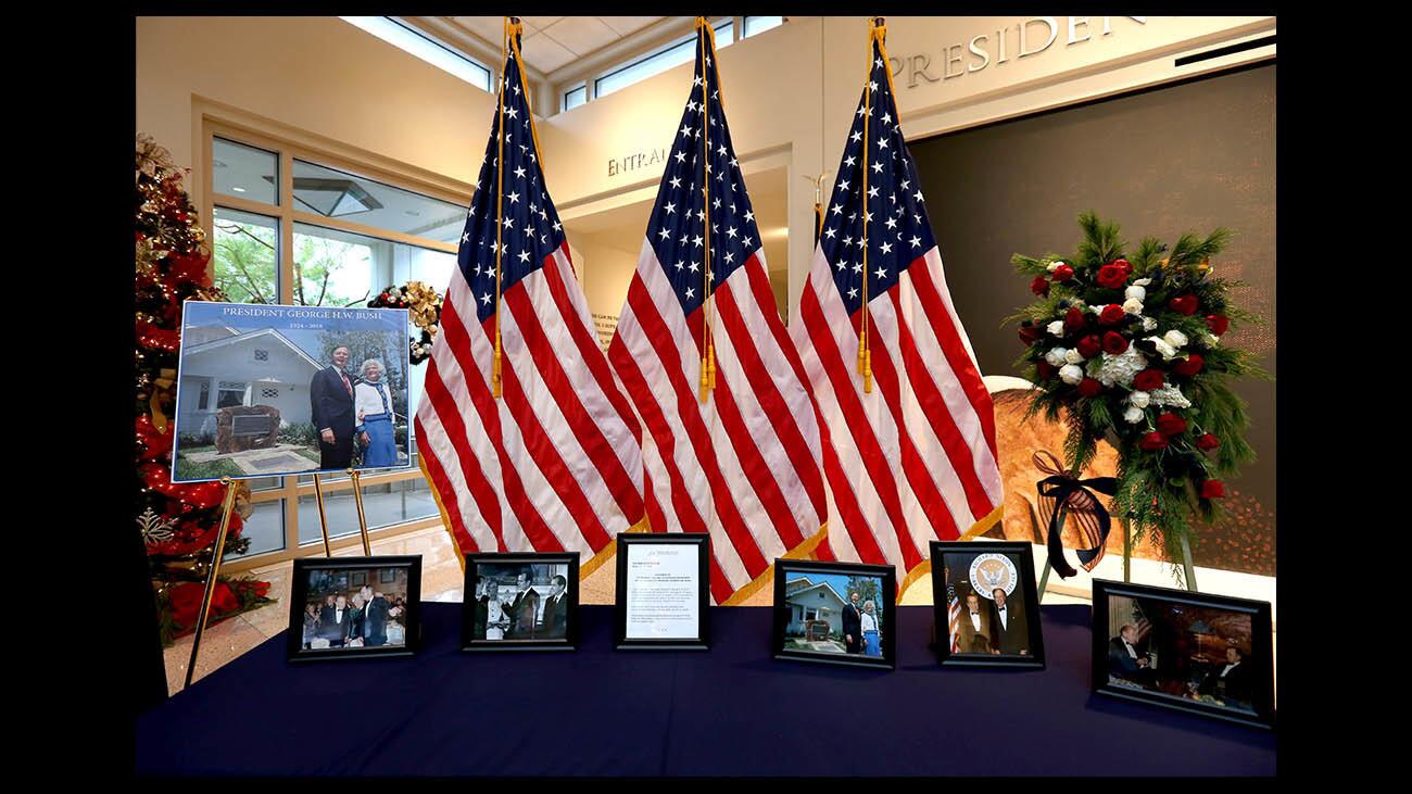 Photo Gallery: Visitors watch broadcast of State Funeral for President George H.W. Bush at Nixon Library