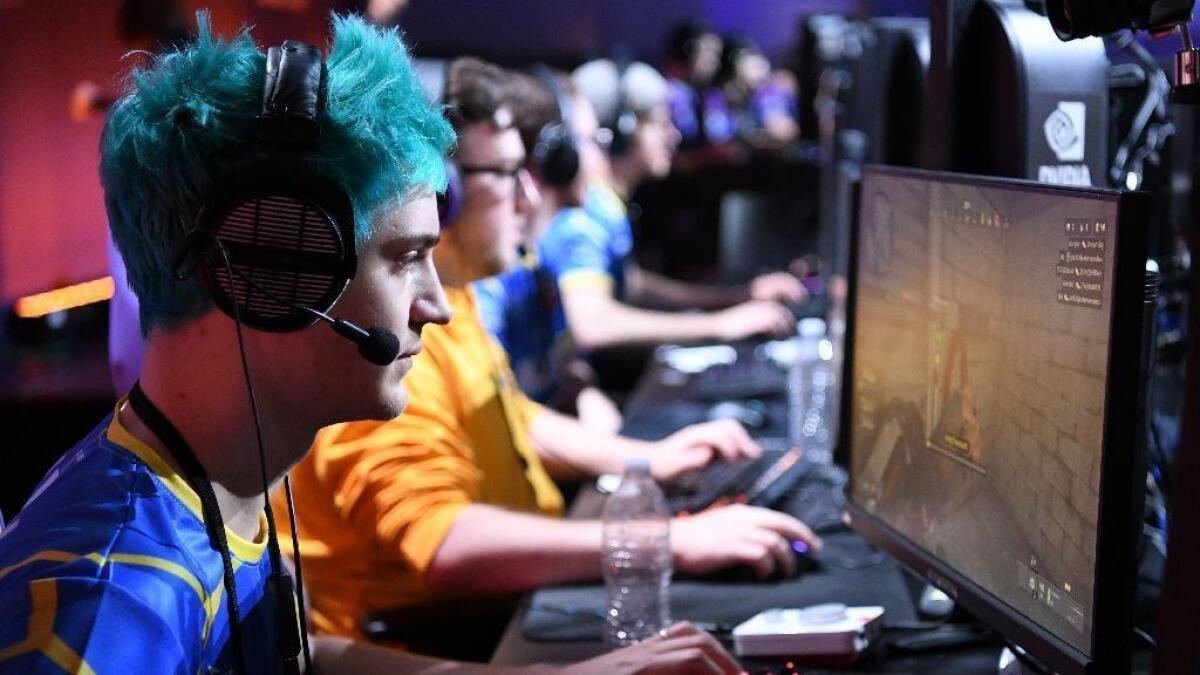 Tyler "Ninja" Blevins plays Call of Duty: Black Ops 4 during the Doritos Bowl 2018 at TwitchCon 2018 in the San Jose Convention Center on Oct. 27, 2018 in San Jose.