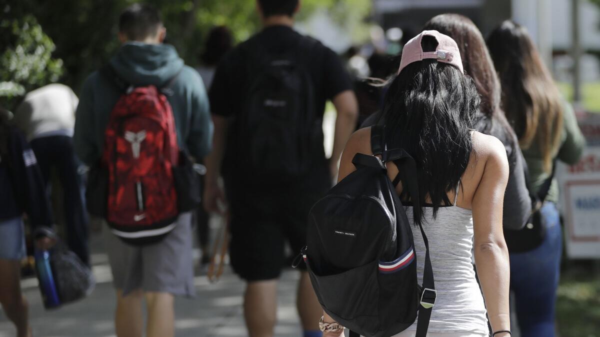 Students on the campus of Miami Dade College, in Miami.