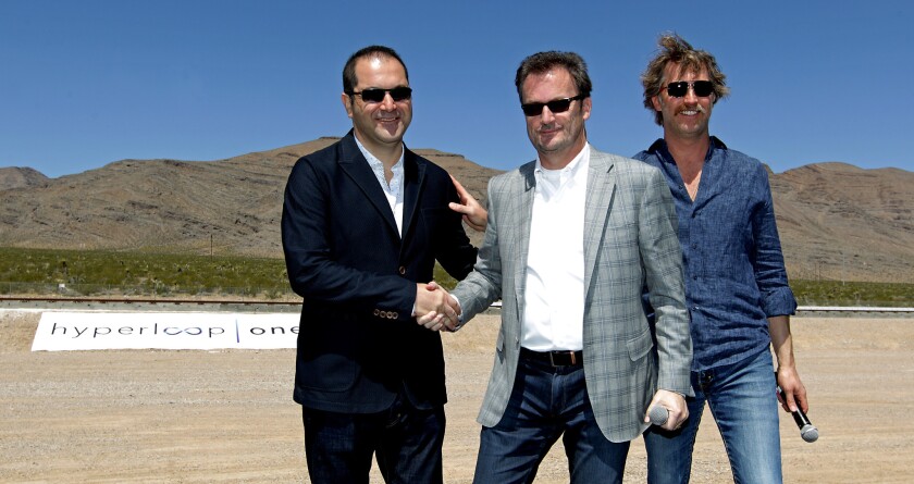 Hyperloop One Executive Chairman Shervin Pishevar, left, Chief Executive Rob Lloyd and then-Chief Technology Officer Brogan BamBrogan attend a company event in May.