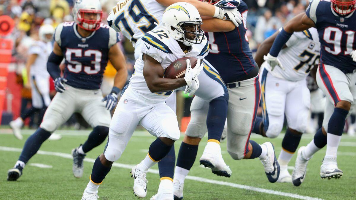 The Chargers' Branden Oliver carries the ball against the New England Patriots on Oct. 29.