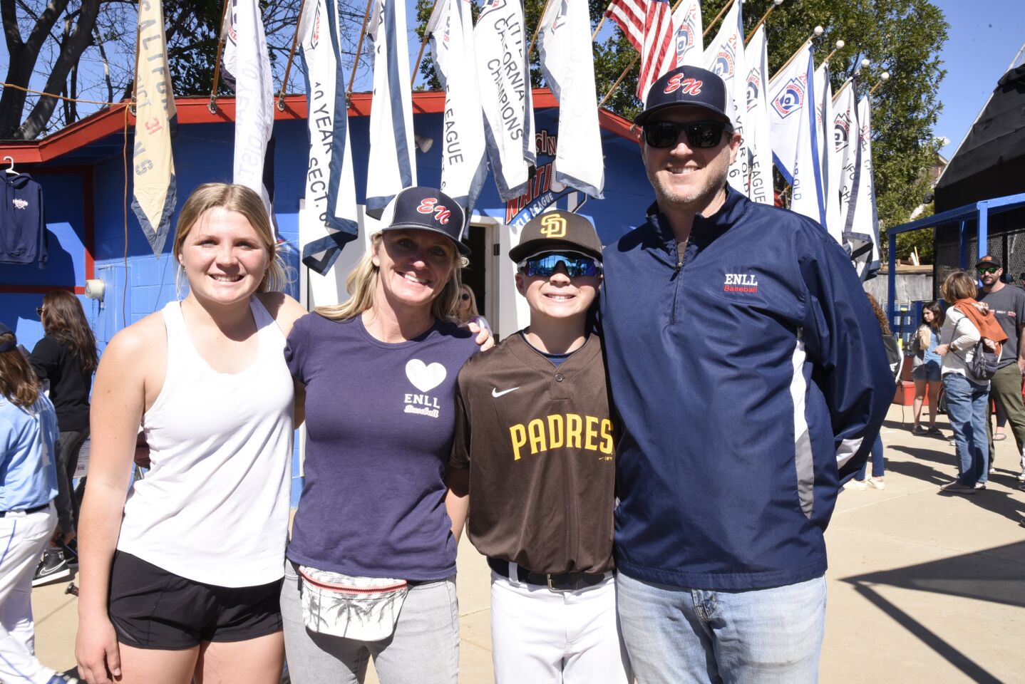 Encinitas National Little League President Andy Jasper (right) with daughter Lily, wife Courtney Jasper and son Drew