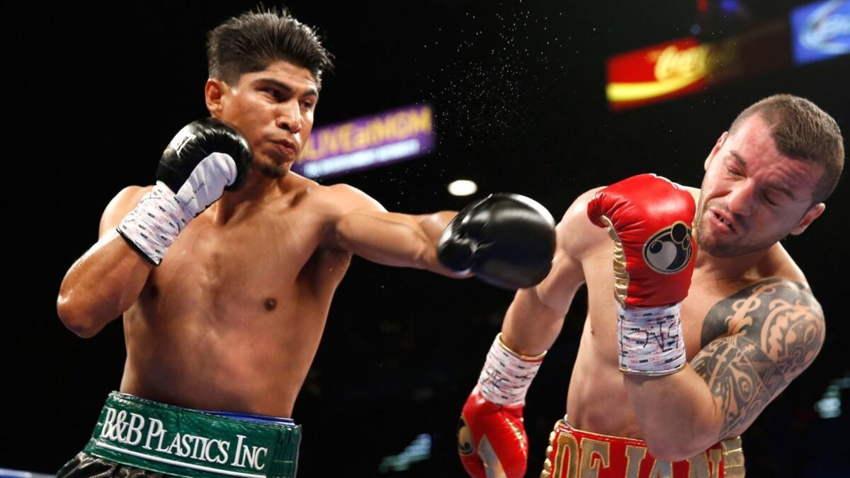 Mikey Garcia connects on Dejan Zlaticanin during their WBC lightweight title fight on Jan. 28, 2017 in Las Vegas.