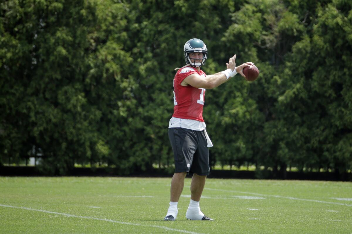 Philadelphia Eagles quarterback Tim Tebow participates in a drill during organized team activities at the NFL team's practice facility Thursday in Philadelphia.