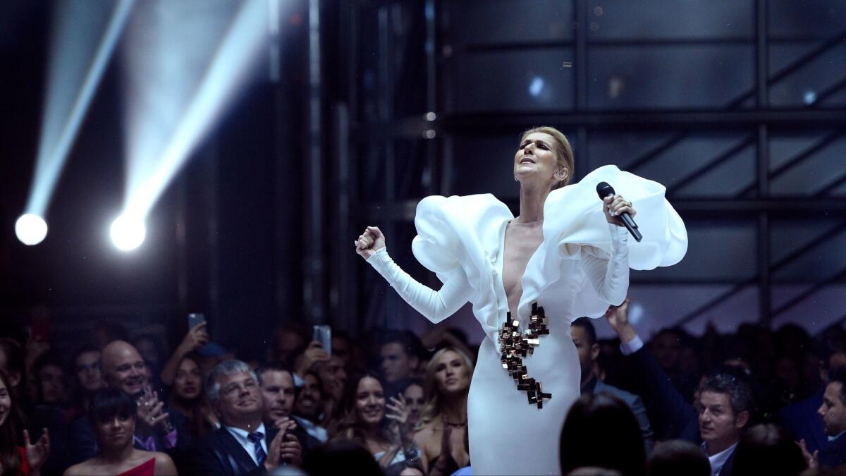 Celine Dion performs. (Chris Pizzello/Invision/Associated Press)