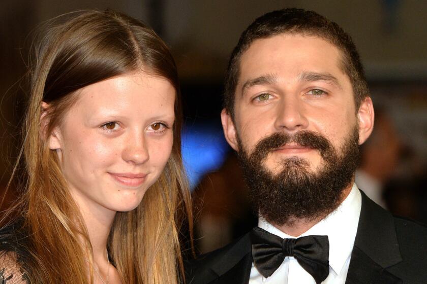 Mia Goth and Shia LaBeouf at a "Fury" screening in London in October 2014.