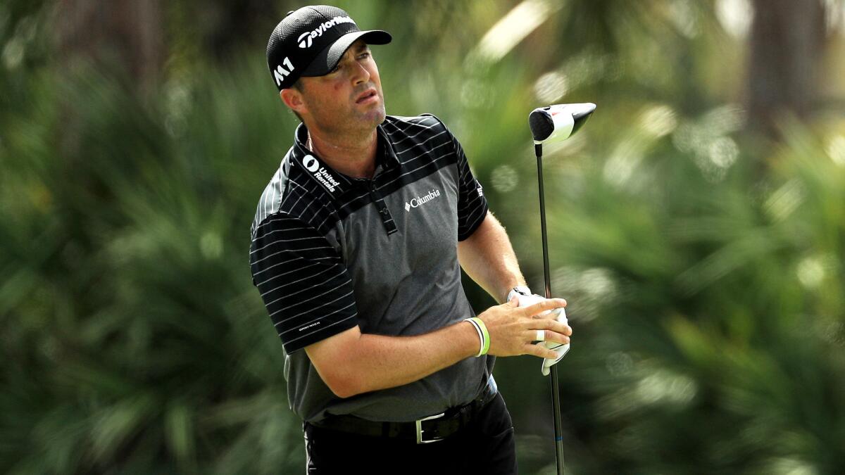 Ryan Palmer watches his tee shot at No. 2 during the second round of the Honda Classic on Friday.
