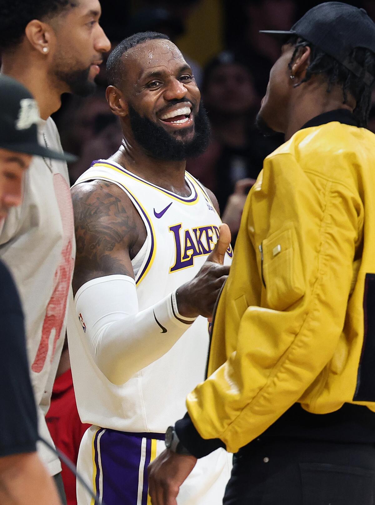 LeBron James celebrates after scoring his 40,000th career point.