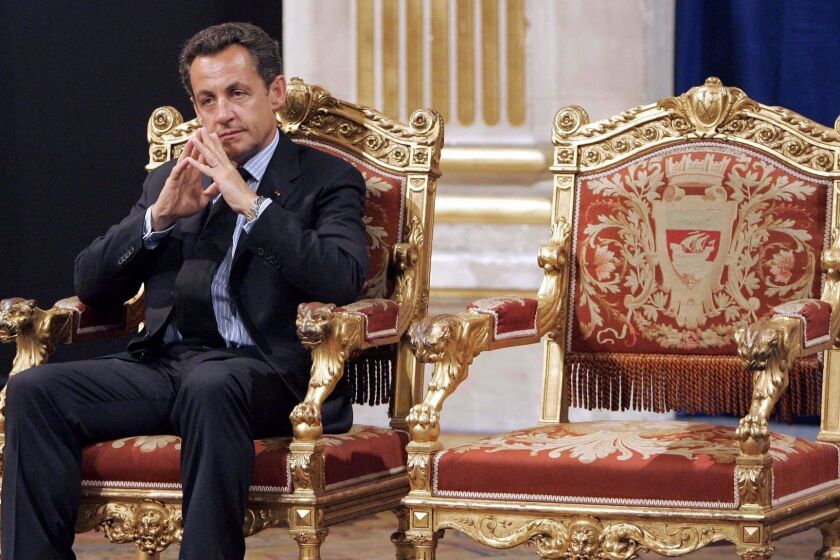Former French President Nicolas Sarkozy, shown in 2007, has been ordered to stand trial in a fraud inquiry.