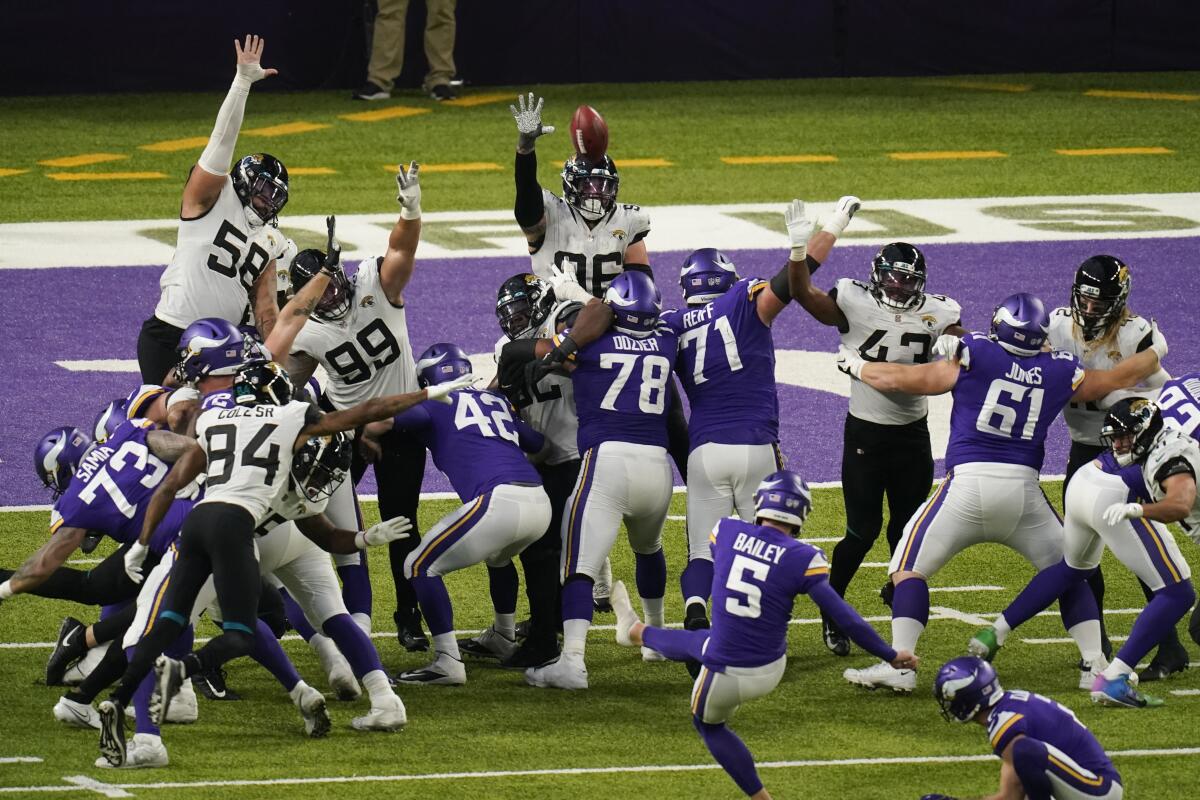 Minnesota Vikings kicker Dan Bailey makes a 23-yard field goal in overtime against the Jacksonville Jaguars.