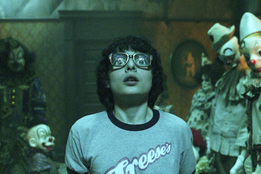 This image released by Warner Bros. Pictures shows Finn Wolfhard in a scene from "It." (Warner Bros. Pictures)