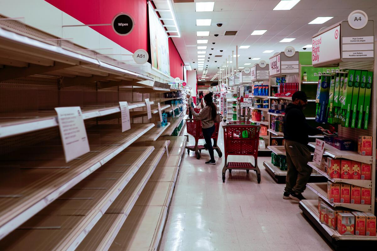 Empty shelves at a Target in Cypress, Calif. 