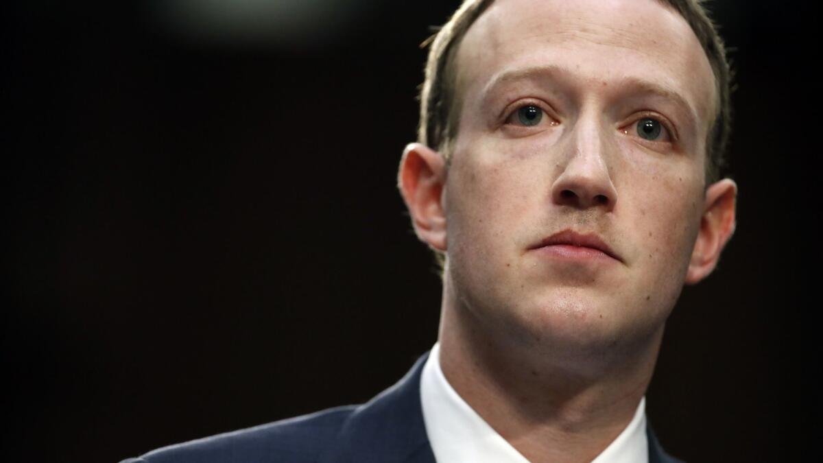 Facebook CEO Mark Zuckerberg testifies before a joint hearing of the Commerce and Judiciary committees in Washington in April.