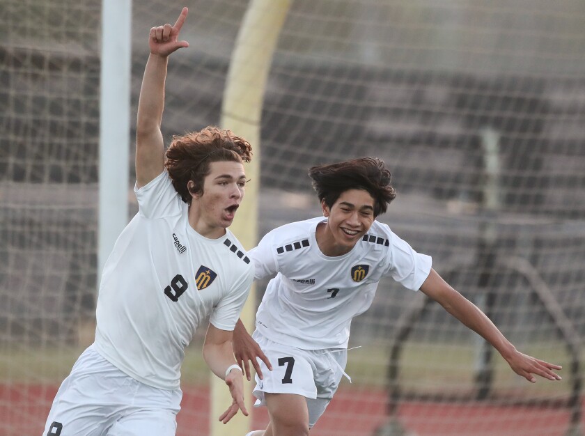 Marina forward Ted Frousiakis (9) celebrates his second goal with teammate Taylen Vo (7).