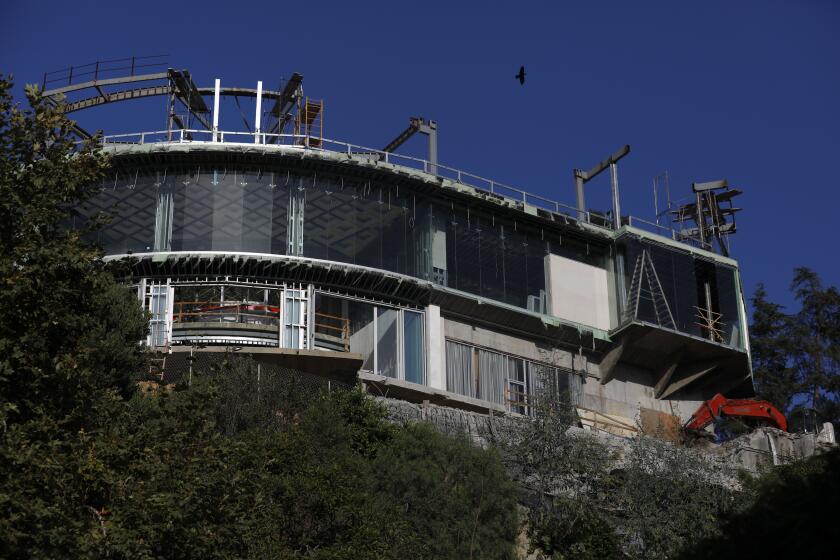 BEL AIR, CA AUGUST 17, 2019: The unfinished mansion on Strada Vecchia Road in the Bel-Air neighborhood of Los Angeles, CA August 17, 2019. (Francine Orr/ Los Angeles Times)