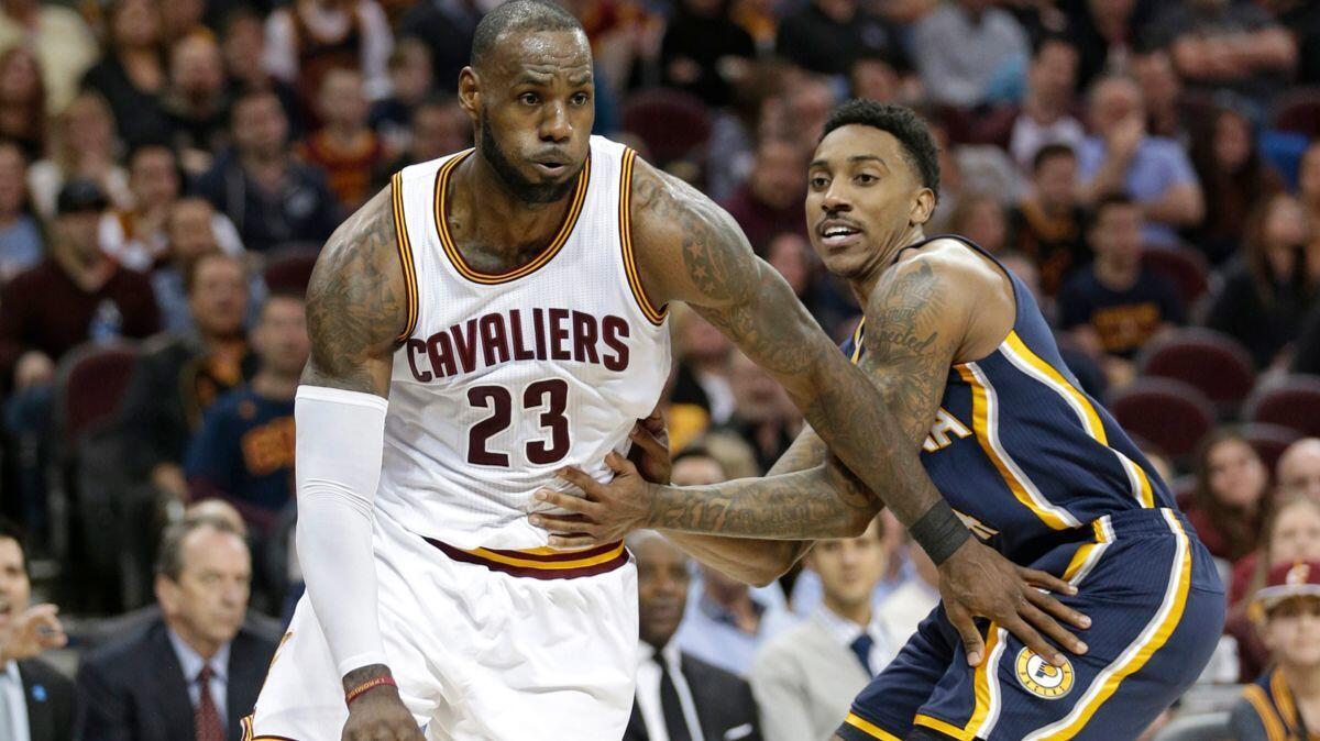 Cleveland Cavaliers' LeBron James (23) drives against Indiana Pacers' Jeff Teague (44) in the first half on April 2.