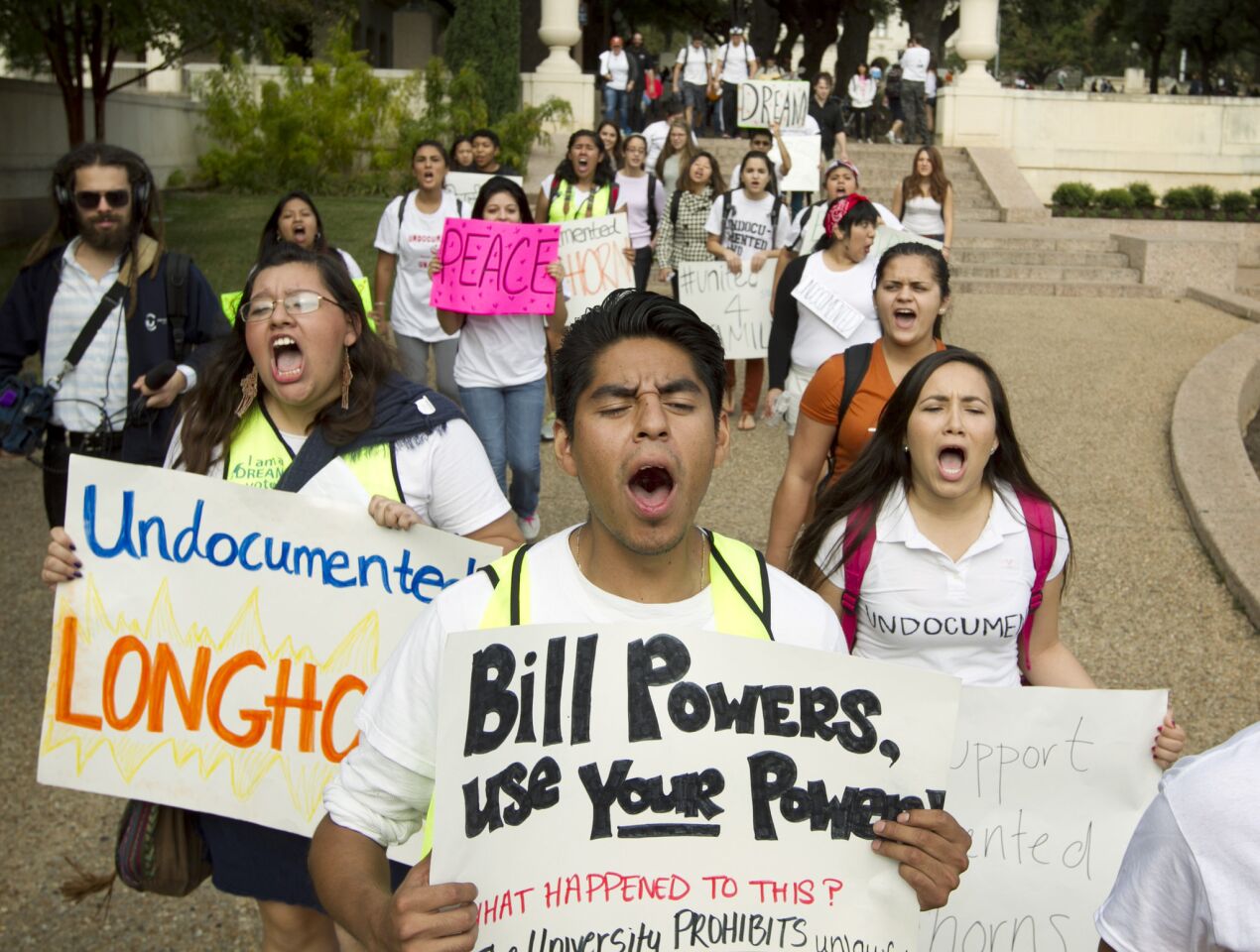 Student Jonathan Hernandez, center, marches in an immigration rights rally on the University of Texas campus in Austin.