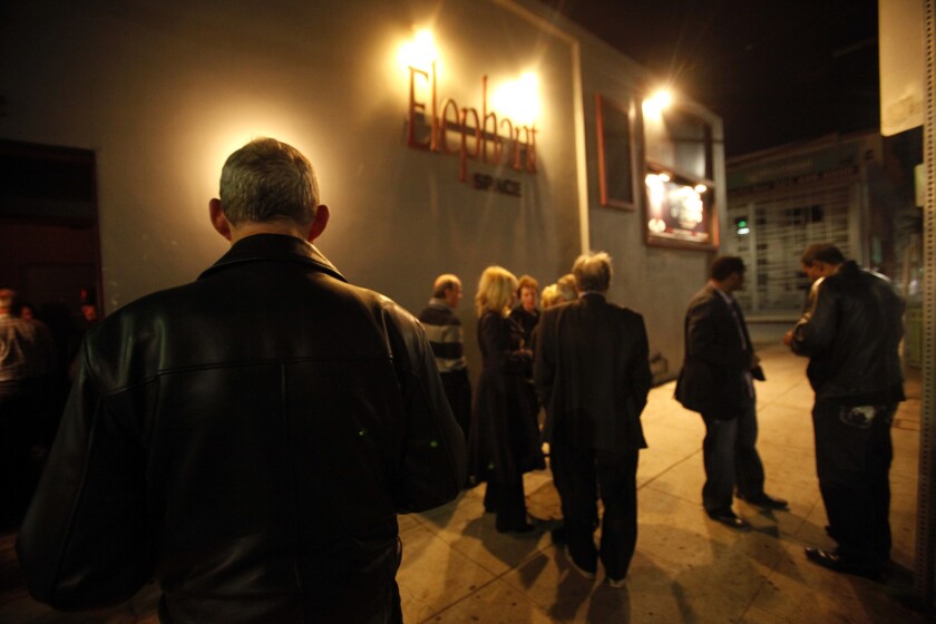 Theater patrons get some fresh air at intermission during "The Twilight of Schlomo" in January 2014 at Elephant Theatre Co. The company, known for championing new plays, has ceased operations for now.