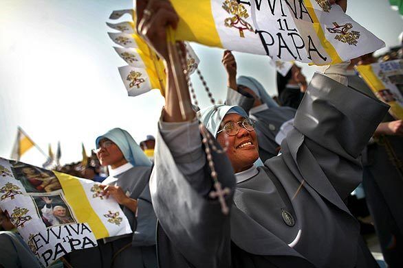 Nuns attend the Mass celebrated by Pope Benedict XVI on Mt. Precipice, just outside the northern Arab-Israeli city of Nazareth.
