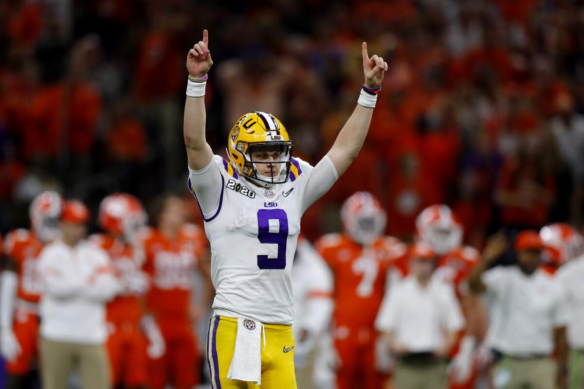 LSU quarterback Joe Burrow reacts to a touchdown against Clemson during the third quarter in the College Football Playoff championship game on Monday in New Orleans.