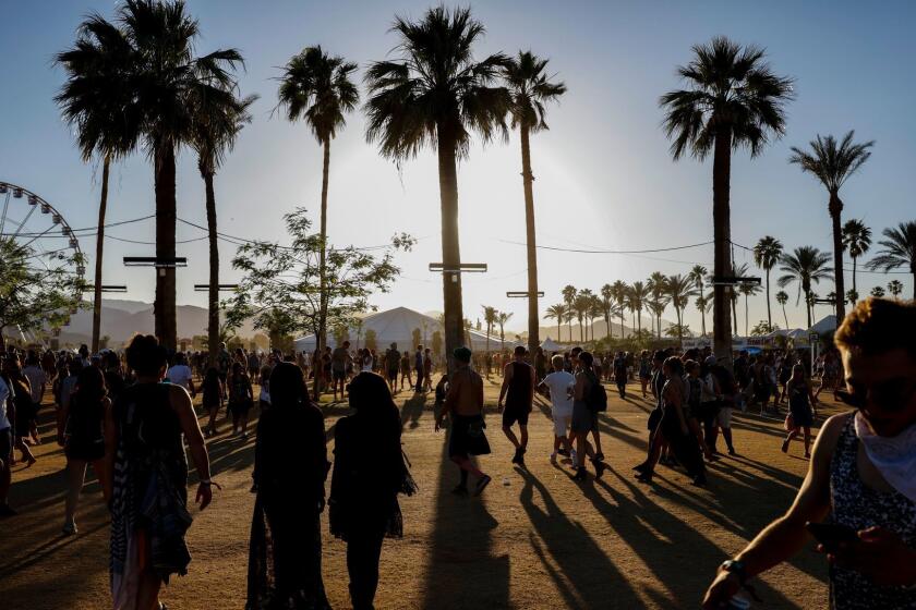 INDIO, --APRIL 23, 2016-- Shadows grow long as the sun begins to set on the second day of weekend two of the Coachella Valley Music and Arts Festival, on the Empire Polo grounds in Indio, CA, April 23, 2016. (Jay L. Clendenin / Los Angeles Times)
