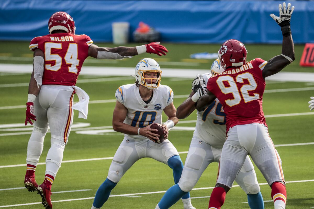 Chargers rookie quarterback Justin Herbert deals with the Kansas City Chiefs pass rush in his first NFL start.