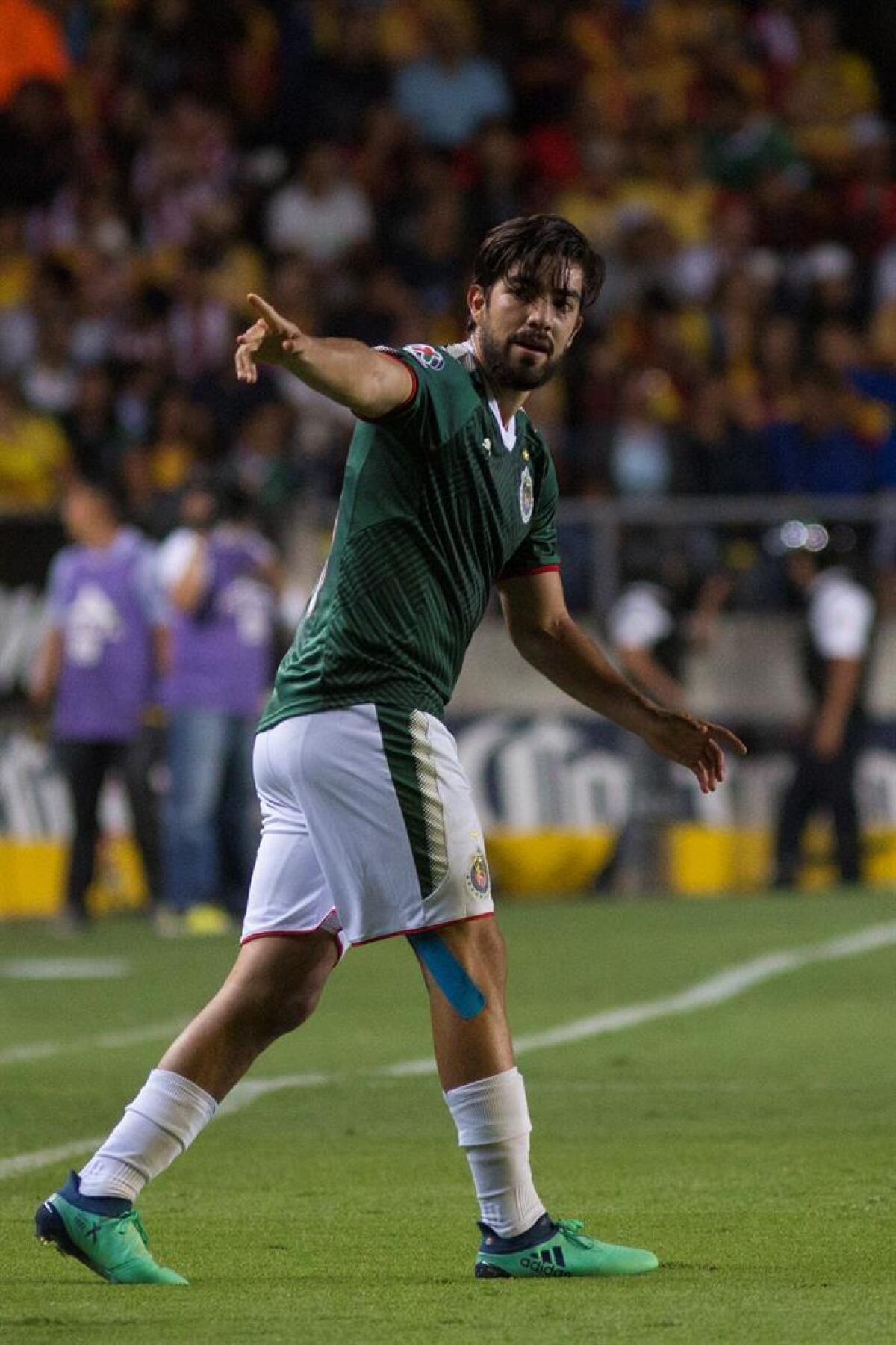 Guadalajara's Rodolfo Pizarro (20) celebrates with teammates after scoring against Toronto FC during the first half in the first leg of the CONCACAF Champions League soccer final, Tuesday, April 17, 2018, in Toronto. (Chris Young/The Canadian Press via AP)