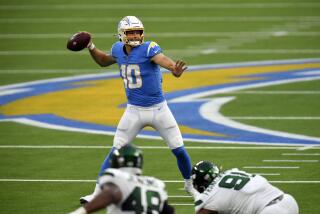 Chargers quarterback Justin Herbert throws against the New York Jets in 2020.