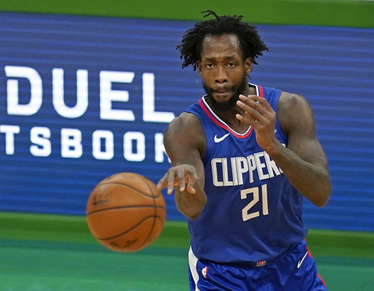 Clippers guard Patrick Beverley makes a pass against the Boston Celtics.
