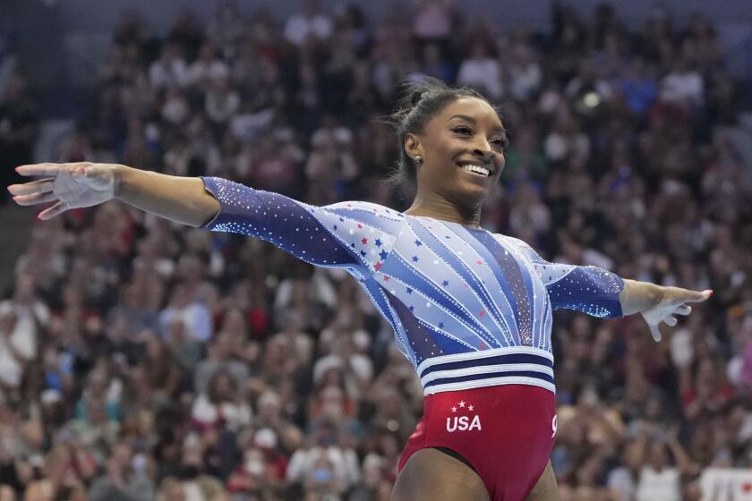 Simone Biles competes in the floor exercise at the United States Gymnastics Olympic Trials.