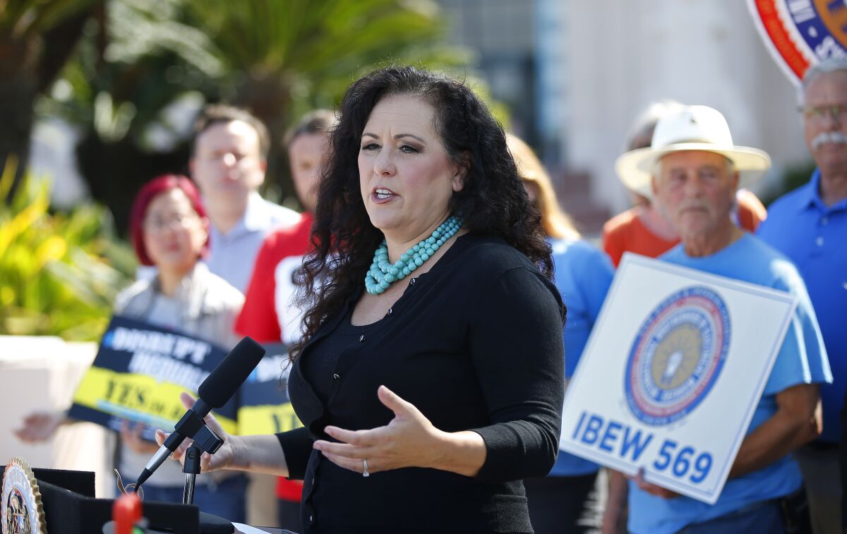 Assemblywoman Lorena Gonzalez speaks at a news conference in San Diego in August of last year in support of Assembly Bill 5. 