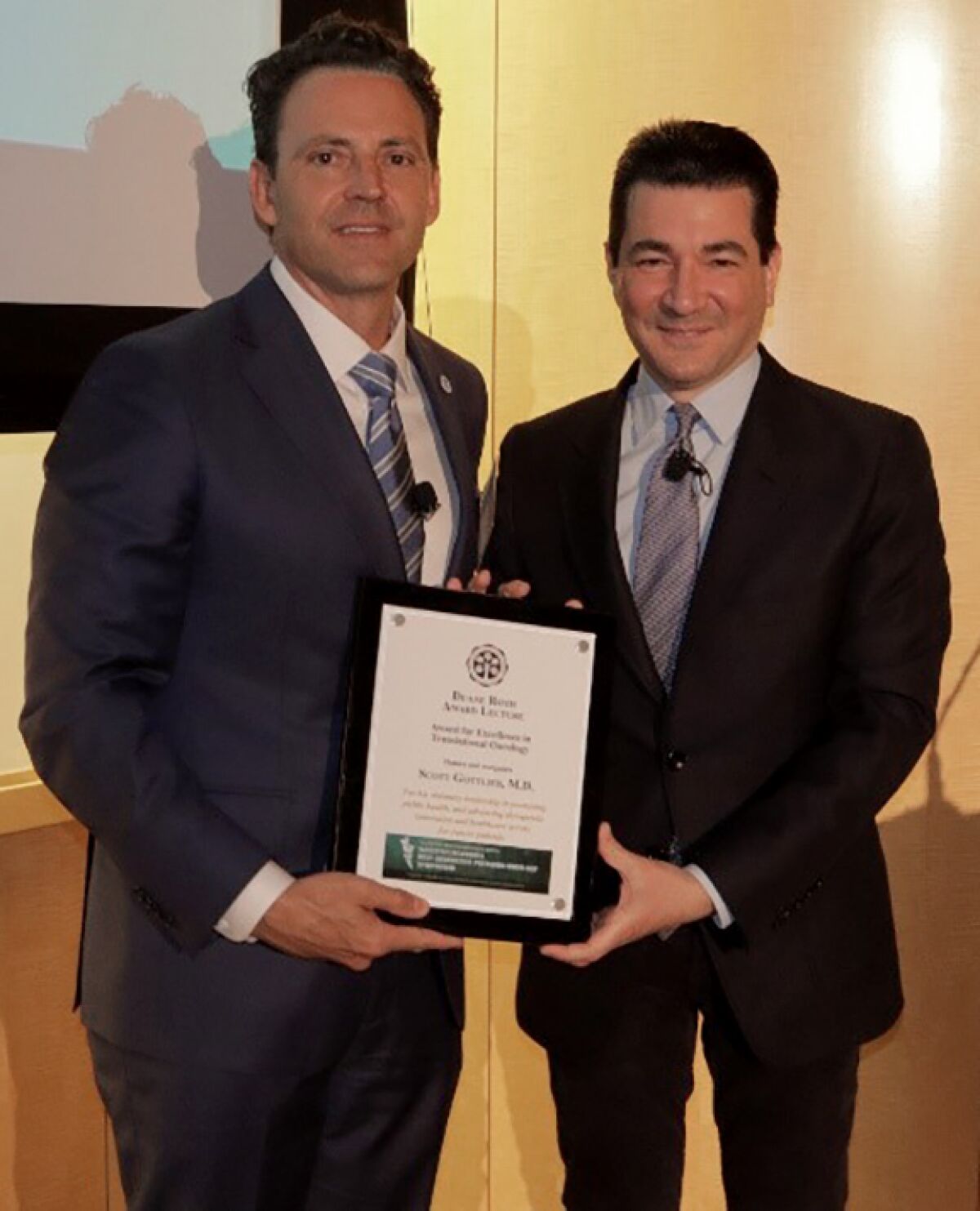4th District San Diego County Supervisor Nathan Fletcher (left) presents Dr. Scott Gottlieb with the Duane Roth Achievement Award and proclaims Feb. 20, 2020 as "Scott Gottlieb Day."