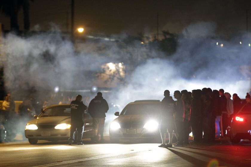 LOS ANGELES, CA APR. 15, 2015 Illegal Street racing activities on Ana Street in Compton on Apr. 13, 2015. One of the several illegal street racing locations racers raced. (Lawrence K. Ho / Los Angeles Times)