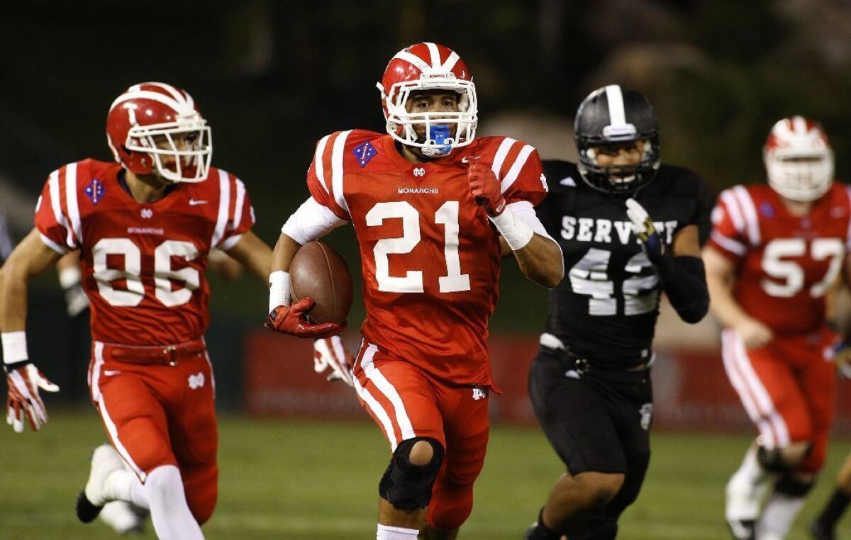 Jonathan Lockett runs for a touchdown last season.