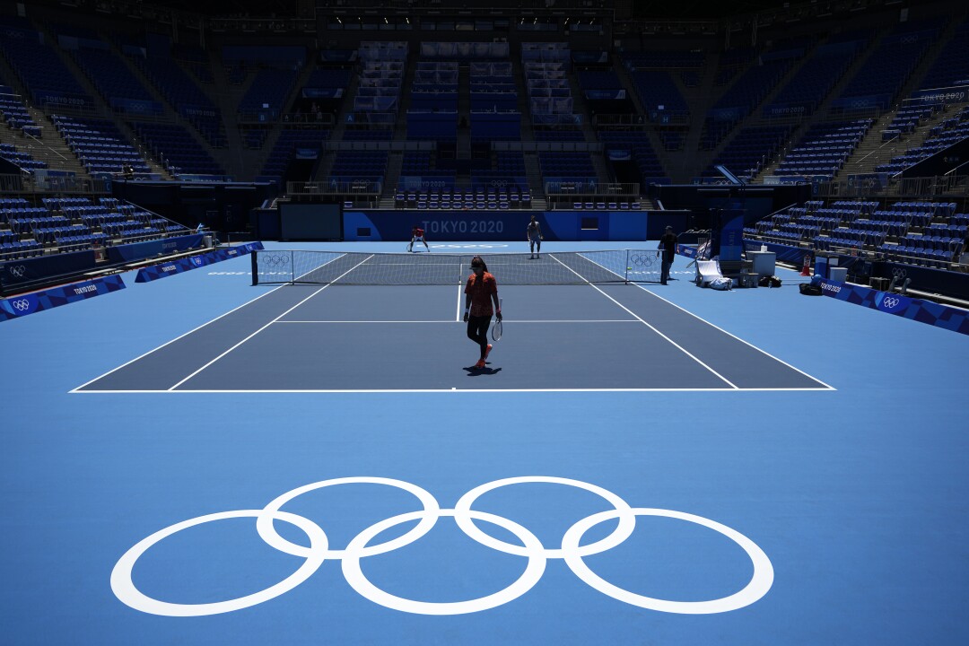 Naomi Osaka on a tennis court 