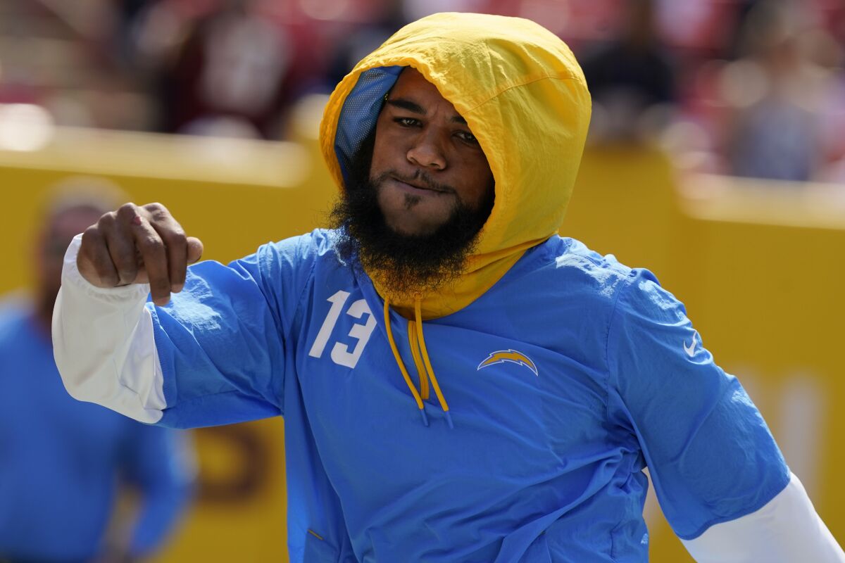 Los Angeles Chargers wide receiver Keenan Allen (13) during pregame warmups prior to the start of the first half of an NFL football game against the Washington Football Team, Sunday, Sept. 12, 2021, in Landover, Md. (AP Photo/Alex Brandon)